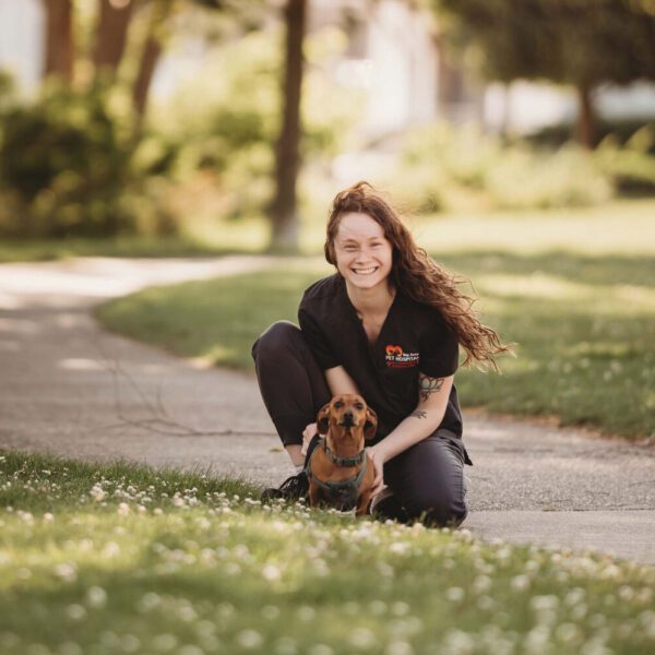 Brittany with her dog in the park