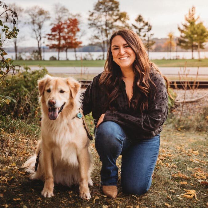 Darby Williams outside with her dog